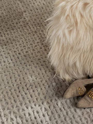 Amanda sculpted grey rug in Merino lambskin with organic texture
