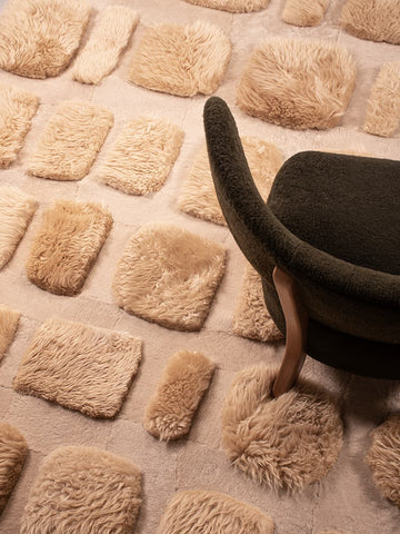 Soft shearling rug detail in warm sand tone – Homelosophy luxury custom sized rugs