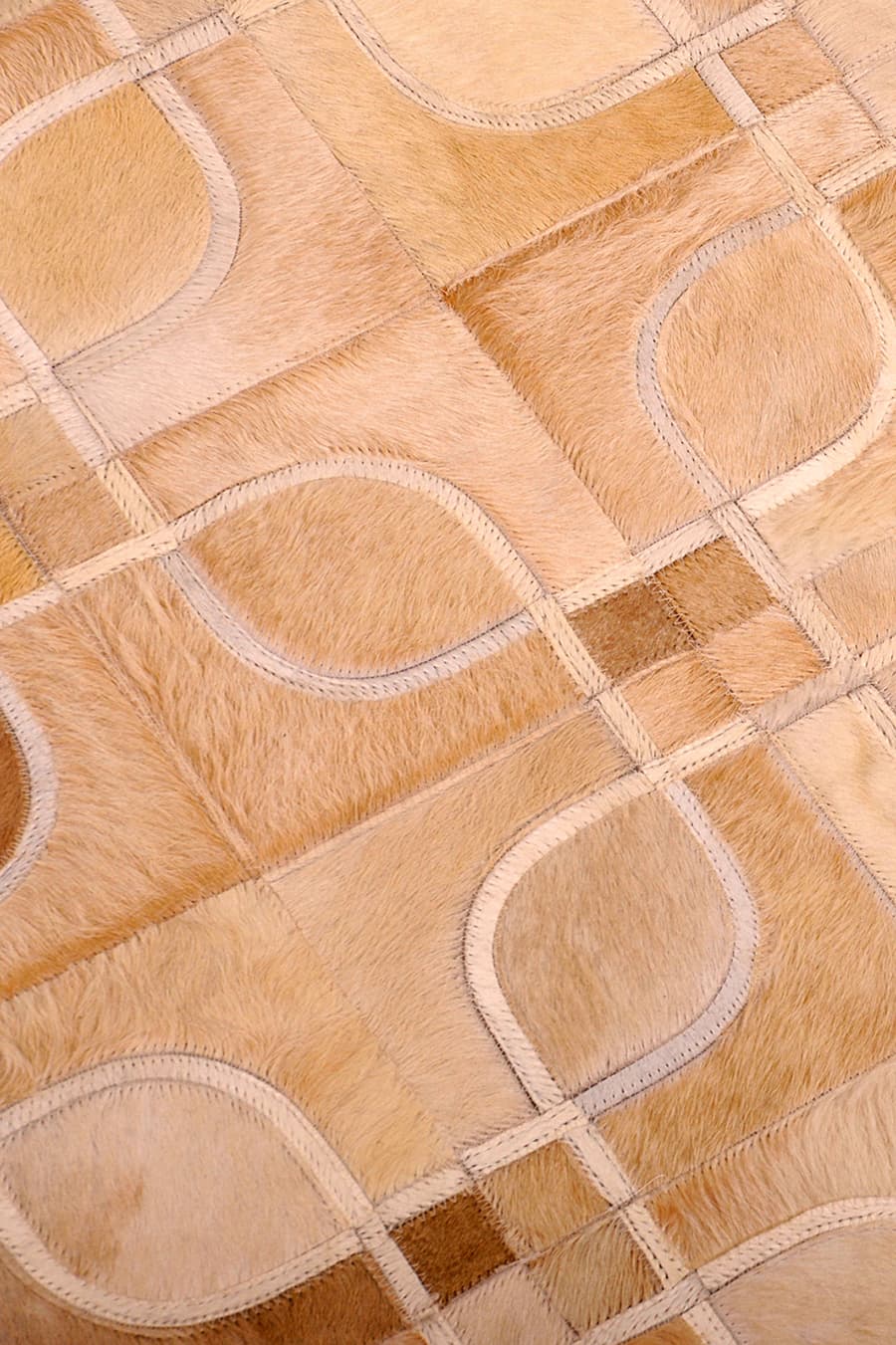 EYES – Geometric Cowhide Rug with Curved Motif