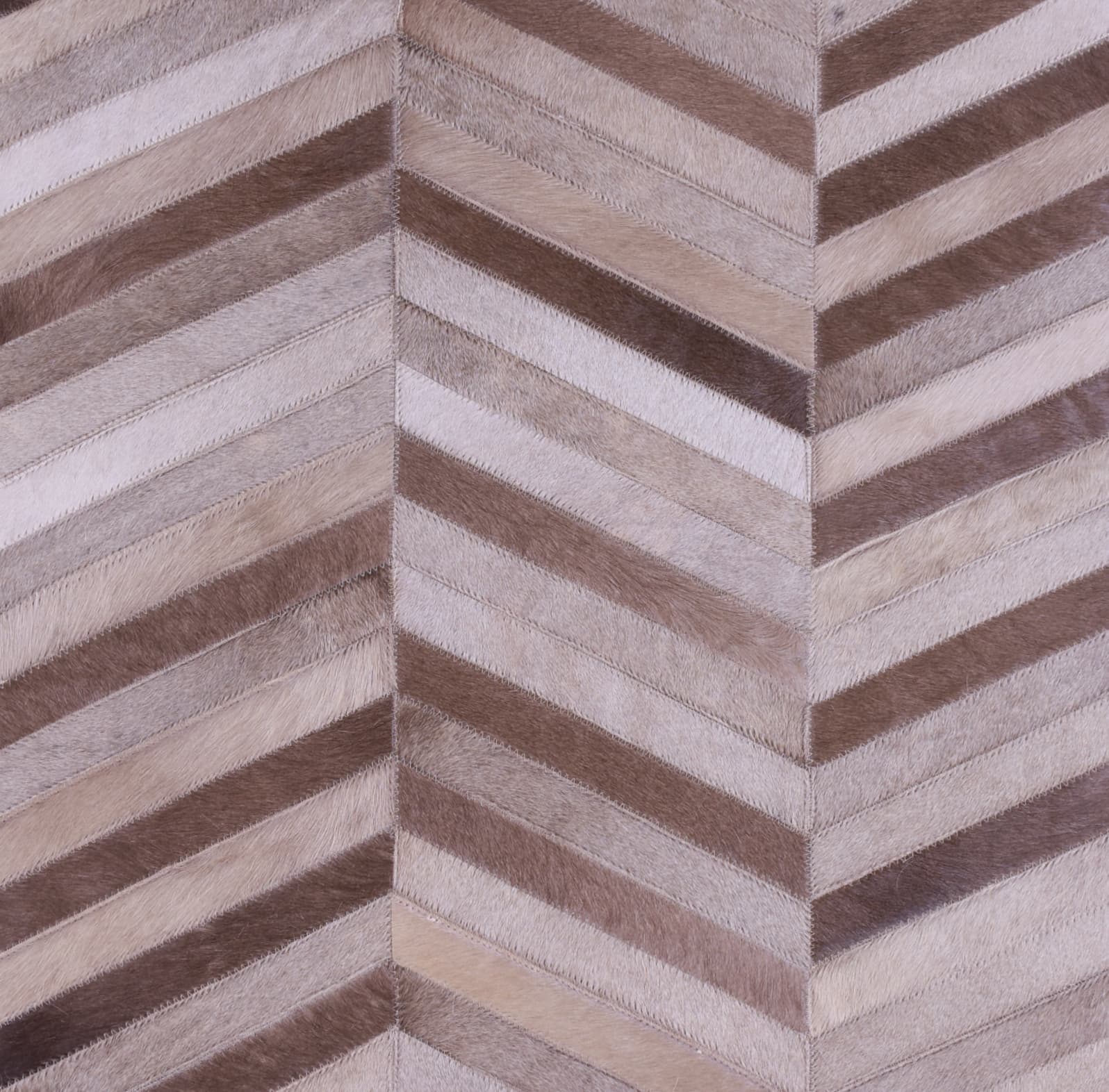 HERRINGBONE LONG – Large Patchwork Cowhide Rug