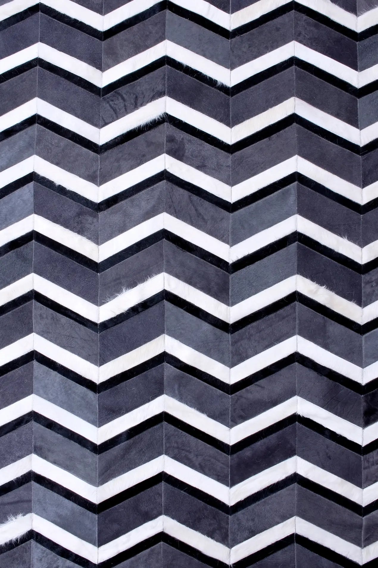 MULTI HERRINGBONE – Chevron Patchwork Cowhide Rug