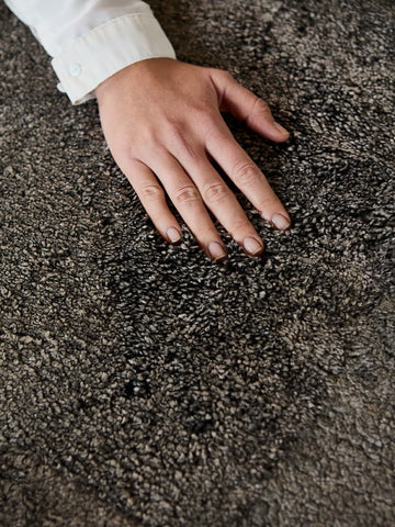Natural plain lambskin rug in soft charcoal melange tone