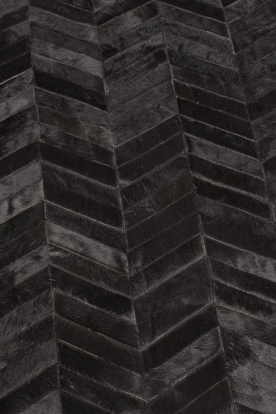 ROUND HERRINGBONE – Large Designer Cowhide Rug