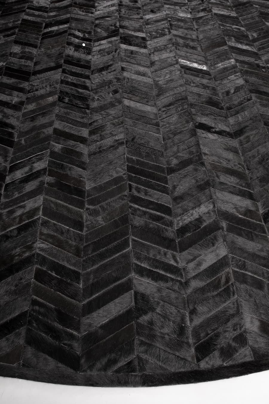 ROUND HERRINGBONE – Large Designer Cowhide Rug