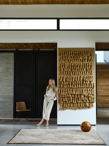 Standy organic sheepskin rug in Sand of Time with suede leather border