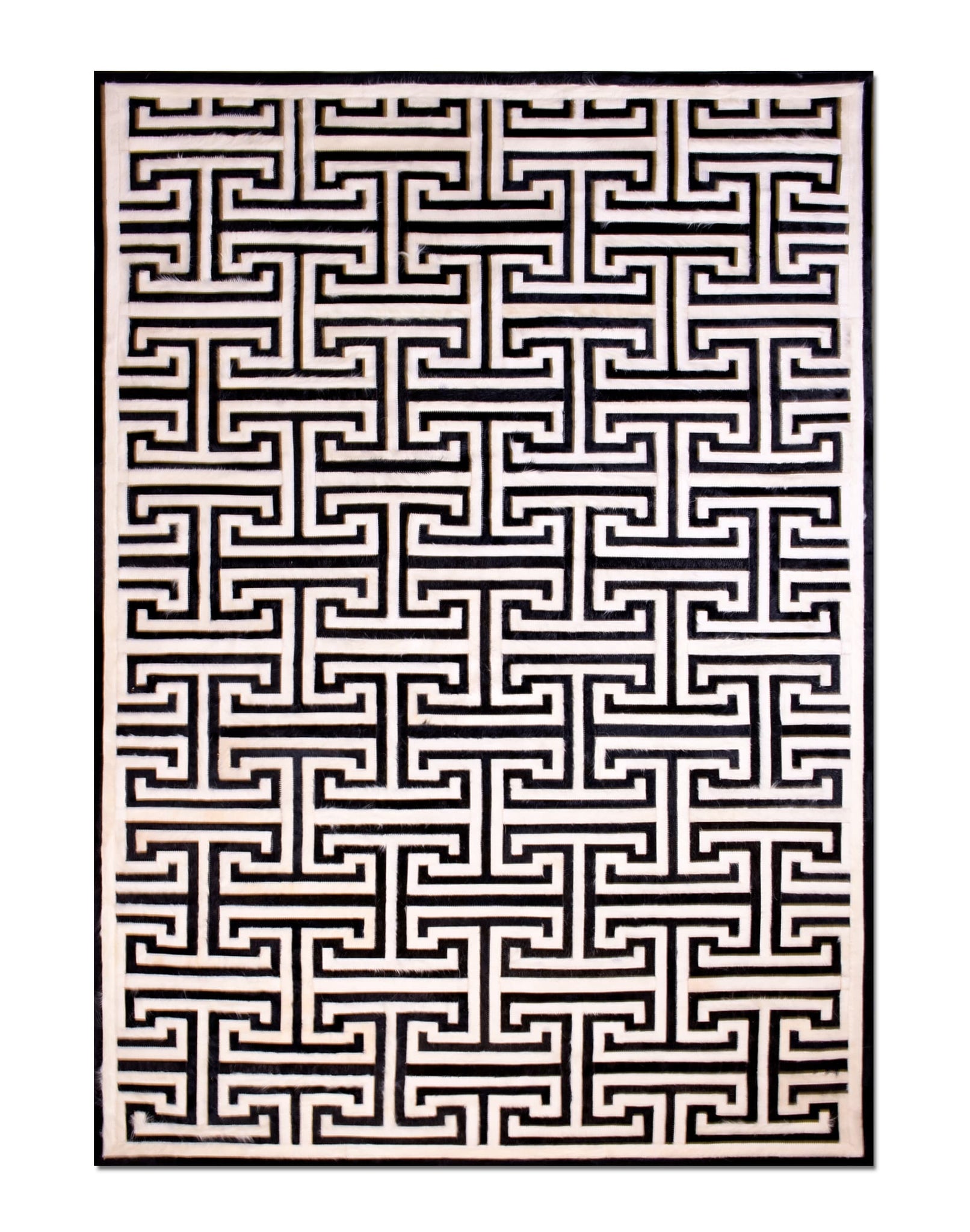 T MODEL – Maze-Inspired Cowhide Patch Rug