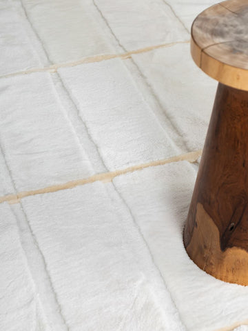 Whisper Mercerized Shearling Rug in optic white and cake butter tones