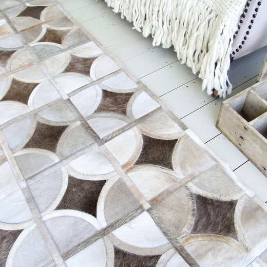 Alpha – Custom Animal Hide Rug in Geometric Circle Pattern