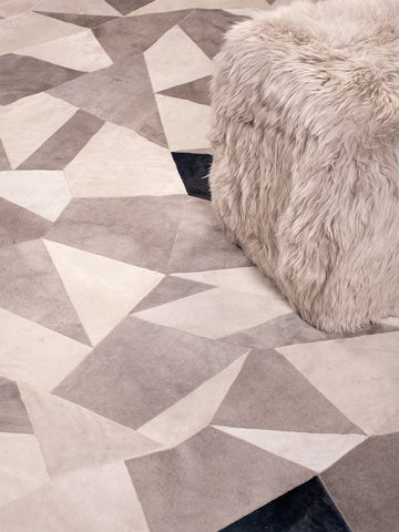 Broken cowhide rug in blue and platinum by Homelosophy