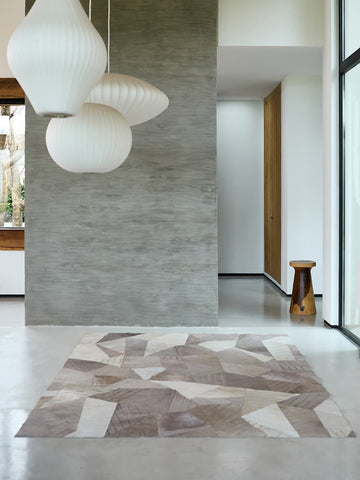 Tailored patchwork rug handcrafted for high-end interiors