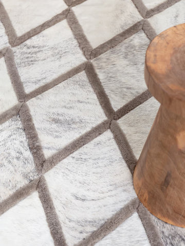 Diamonds hide and shearling rug with geometric inlay pattern