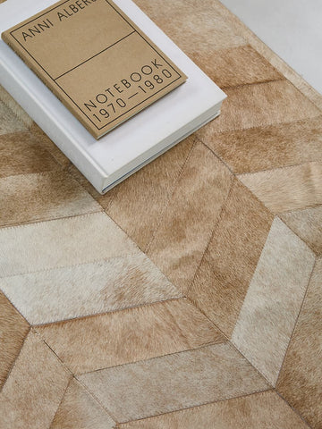 Herringbone animal pattern rug handcrafted in cowhide
