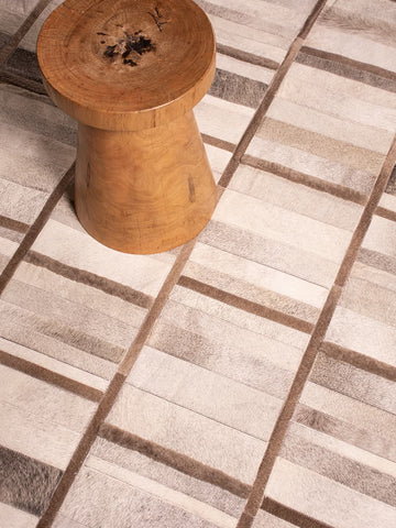 INTERSECTION rug styled with wood stool | Homelosophy