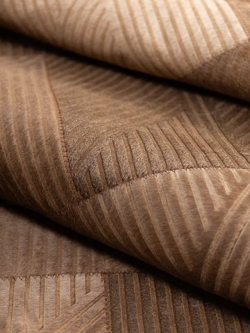 Lasered cowhide rug for sophisticated living room interiors