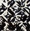 Squares – Black and White Patagonian Cowhide Rug with Geometric Stitching