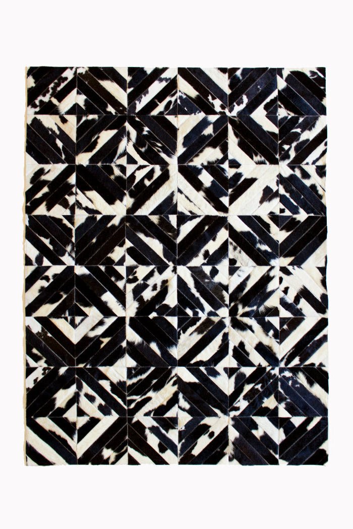 Squares – Black and White Patagonian Cowhide Rug with Geometric Stitching